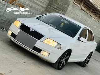  1 سكودا نيو 2006 دهان جديد  فحص ممتاز وتخلو من القص والضربات هيئه جديد فرش جلد  شاشه اندرو
