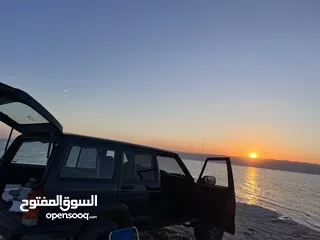  13 للبيع - جيب شيروكي XJ موديل 1999  جاهز للبر والمغامرات!