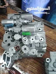  2 مستشار وخبير بعطل السيارات وخاصه الجير الاتوماتيك  ويوجد قسم صيانه للجير الاتوماتيك وقطعه واجيار