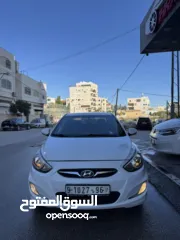  2 هونداي اكسنت 2015 محرك 1600 ديزل لون ابيض فرش جلد تشغيل بصمه حساسات خلفيه كاميرا خلفيه ترخيص وتامين