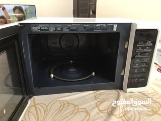  2 Samsung Microwave Oven with Convection MC28H5015AW 28Ltr.. Mint condition rarely used.