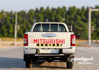  5 Mitsubishi L200 2.4 L 2021 GCC accident free in excellent condition 1303 P.M