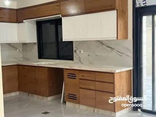  4 شقه للبيع في عين منجد  طابق ارضي مع حديقه