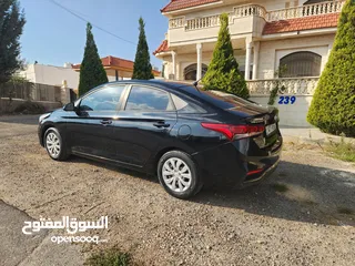  2 هيونداي اكسنت الشكل الجديد لون اسود بحالة الوكالة 1600cc