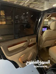  12 ستيشن لكزس lx470 اسود 2002