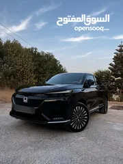 10 Honda E:NS1 E4 electric 2023  هوندا e:ns1 فئة E4 فل اضافات، اسود ميتاليك، داخليه لون ابيض فخمة