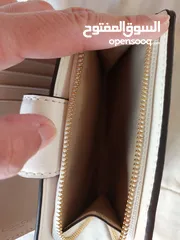  4 محفظة Coach للبيع