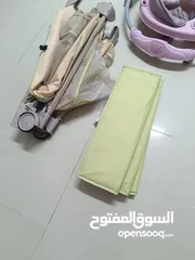  4 تخت بيبي نظيف جدا قابل للطي مثل ما هو وضح بالصور  عربايه مشي للاطفال تفتح وتسكر بحاله جيده جدا
