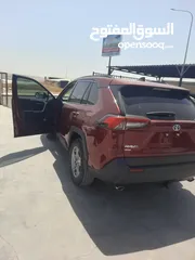  12 تويوتا راف فور XLE موديل 2022 لون خمري داخل جلد اسود عداد قليل