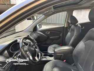  22 2009 ‏Hyundai توسان LX20 اربع ابواب، اللون فيراني، الكراسي جلد والسيارة 92,000 كيلو فقط وبحالة رائعة