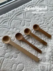  10 4pcs ceramic canister set with wooden spoons - طقم علب سيراميك متكون من 4 قطع مع ملاعق خشبية