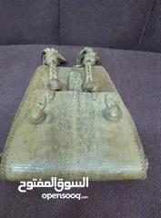  4 نوادر..حقيبة من جلد صغير تنين الكومودو