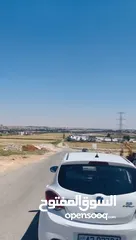  2 قطعة أرض لقطة على طريق المطار خلف جامعة الزيتونة منطقة مميزة جدا - بجانب ڤلل