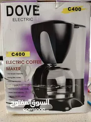  1 ماكينة القهوة الكهربائية Dove Electric C400