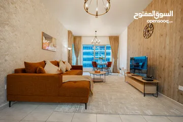  19 دبي لاند SKYCOURT  غرفة وصالة  مفروشة  سوبرلوكس مع بلكونه-إيجار شهري شامل