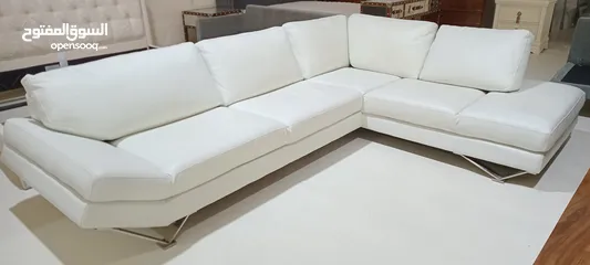  1 leather sectional sofa from natuzzi,   with excellent condition and free delivery all over United AE