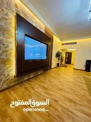  1 Two rooms and a hall for monthly rent in Ajman, overlooking the creek, new furnishings, Al Rashidiya