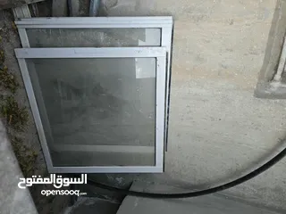  6 باب خشب وشباك المنيوم