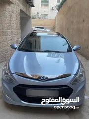  18 هونداي سوناتا هايبرد موديل 2014 مميزة لون ازرق بلو فل اضافات
