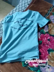  14 * شروة ألبسة جديدة مميزة بسعر مغري جدا _براندات/جينزات عدد 5 و بلايز تيشرتات عدد 5جديدة .اقرا الوصف