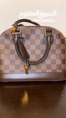  2 LV Louis Vuitton Alma BB handbag small