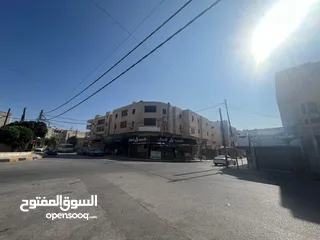  19 مجمع تجاري في وسط إربد عبارة عن محلات وشقق مع تسوية