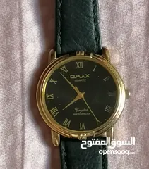  1 ساعة أومكس ياباني شغالة مية بالمية بحالة الوكالة