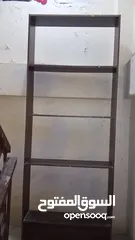  1 ارفوف خشبيه مكتبه ومحل تجاري ودكان ومحل نثريات
