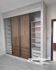  14 خزانه حائط بافضل التصاميم العصريه اضائه داخليه