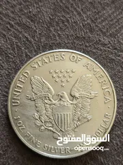 2 اونصه فضه/ عمله نص دولار أمريكي