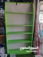  5 رفوف خشب وزجاج وسوبرماركت وقرمه ولوحة اعلانات و معرش زينكو وأبواب سيكريت مظله وألواح خشب تعليق وشبك