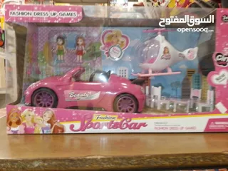  2 لعبه مع سياره وطياره باربي.