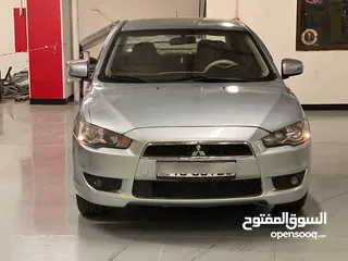  7 ميتسوبيشي لانسر 2016 كرت ابيض