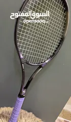  15 كرات تنس إرضي ومضارب