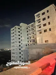  1 شقه للبيع بير زيت  مقابل الجامعه شقه سكنيه عظم واقع اسكان الطله   الغربيه