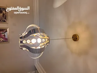  7 ثريا لون ذهبي مع ليد كريستال ( ستينلس ستيل) عدد 2 مستعملة بحالة ممتازة