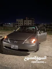  7 هوندا سيفيك هايبرد 2003