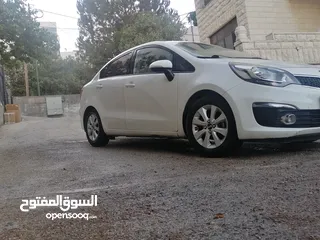  9 كيا برايد 2017 / فحص نخب / ماتور 1400 / اصل برايفت /جير اتوماتيك 4 غيار / عداد قليل