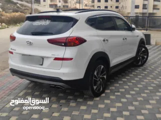  5 هونداي توسان بنزين فل مسكر اضافات دفع رباعي جيب بالكرتونة قطارة بالمصروف