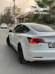  1 تسلا موديل 3 لون أبيض لؤلؤي 2022 Tesla model 3 . 2022