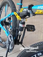  16 دراجة هوائية من نوع SPORTS INC من طراز SHIMANO جنط 26 باللون الأزرق اقرأ الوصف بدقة قابل للتفاوض