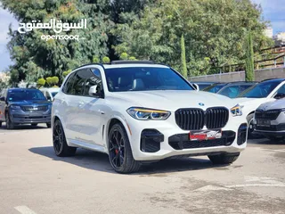  4 BMW X5 45e ترخيص 2022 ترخيص  محرك 3000 هايبرد plug in/يقطع على الشحنه 100 كيلو متر  399 حصان