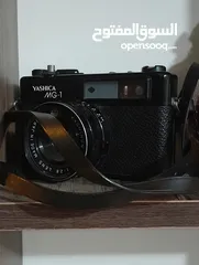  2 كاميرا فنتيج قديمة Yashica mg-1 جلد باللون الأسود معها حزامها شغالة للبيع   بدون شريط فيلم