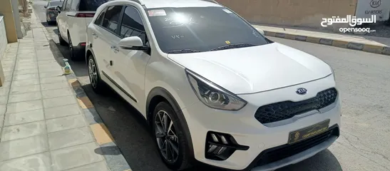  21 كيا نيرو 2021 جمرك جديد وارد كوري ممشي 32  الف فحص كامل جنطات تورنج