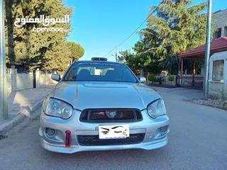  3 سوبارو امبريزا 2004 فل اوبشن مع فتحه sti بسعر حررررررق والله يبارك لصاحب النصيب