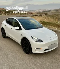  20 Tesla Model Y Long Range Dual motor  موديل 2021 لون لؤلؤي وداخليه اسود فحص اوتوسكور %81 B+