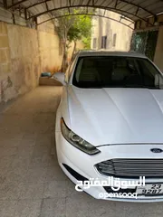  23 Ford Fusion 2015 بحالة الوكالة