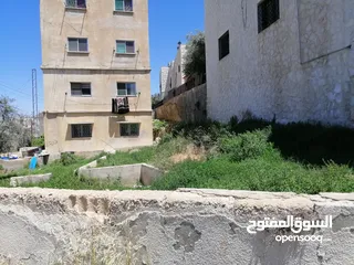  6 عماره مع ارض للبيع تصلح للاستثمار او اسكان