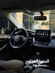  13 تويوتا كورولا هايبرد فحص كامل وارد المركزية وصيانة المركزية لون اسود مميز بحالة جيدة جدا كوشوك جديد
