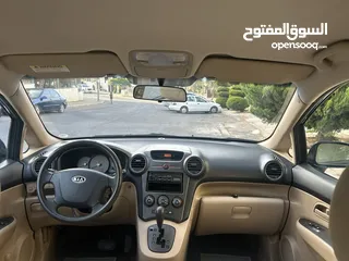  22 كيا كارينز 2008 سبعه راكب تب نضافه السعر قابل للتفاوض بلون كحلي مميز
